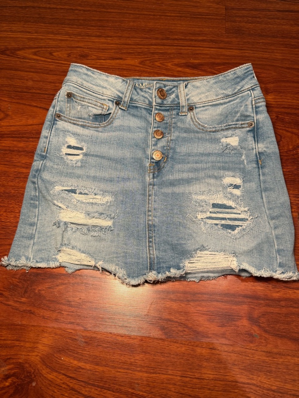 American Eagle Outfitters Light Wash Distressed Denim Mini Skirt